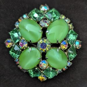 Elegant Silver and Green Brooch